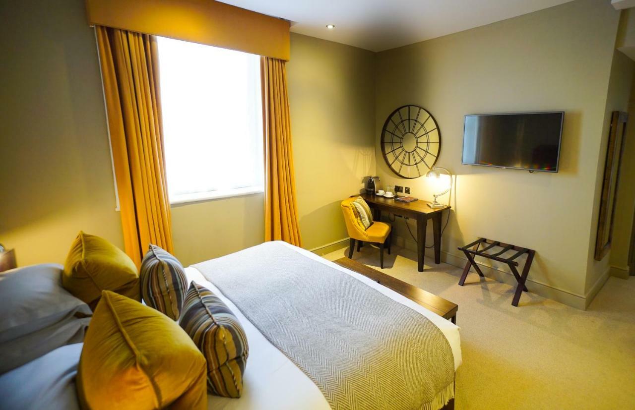 Kings Head Hotel Сайренстер Экстерьер фото